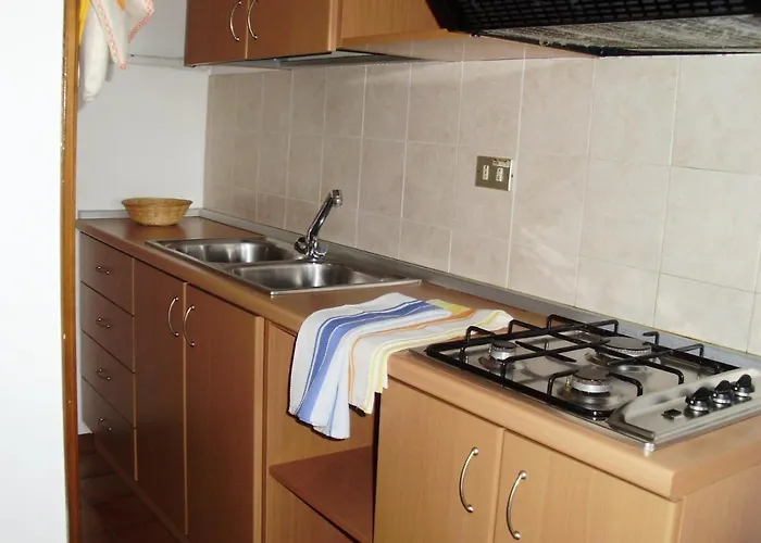 Apartmán Homiday - Pinetina *